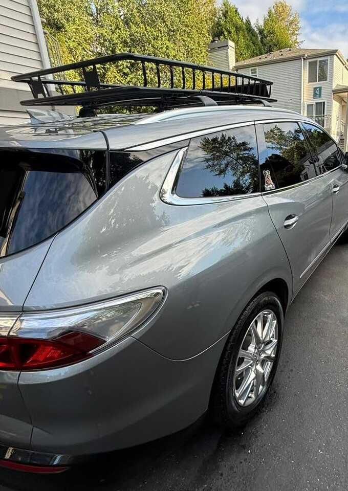 Rear of a silver crossover with clean glass and tail lights