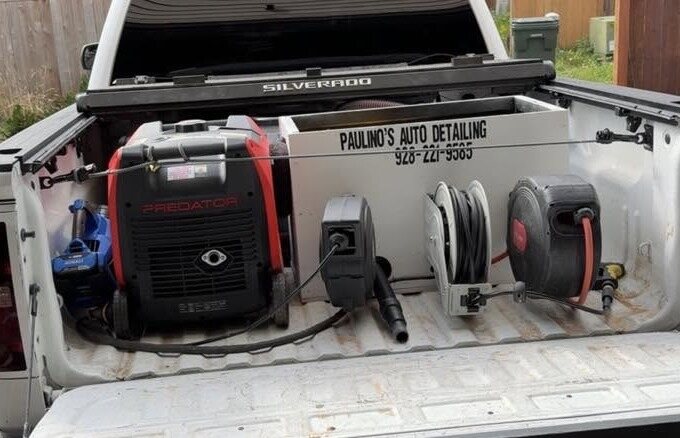 The Paulino's Auto Detailing work truck with its generator and hose reels